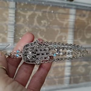 Hamsa Hand earrings with a turquoise bead